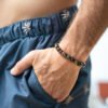 Bracelet Triple Œil 8mm tibétain porté — trois pierres naturelles